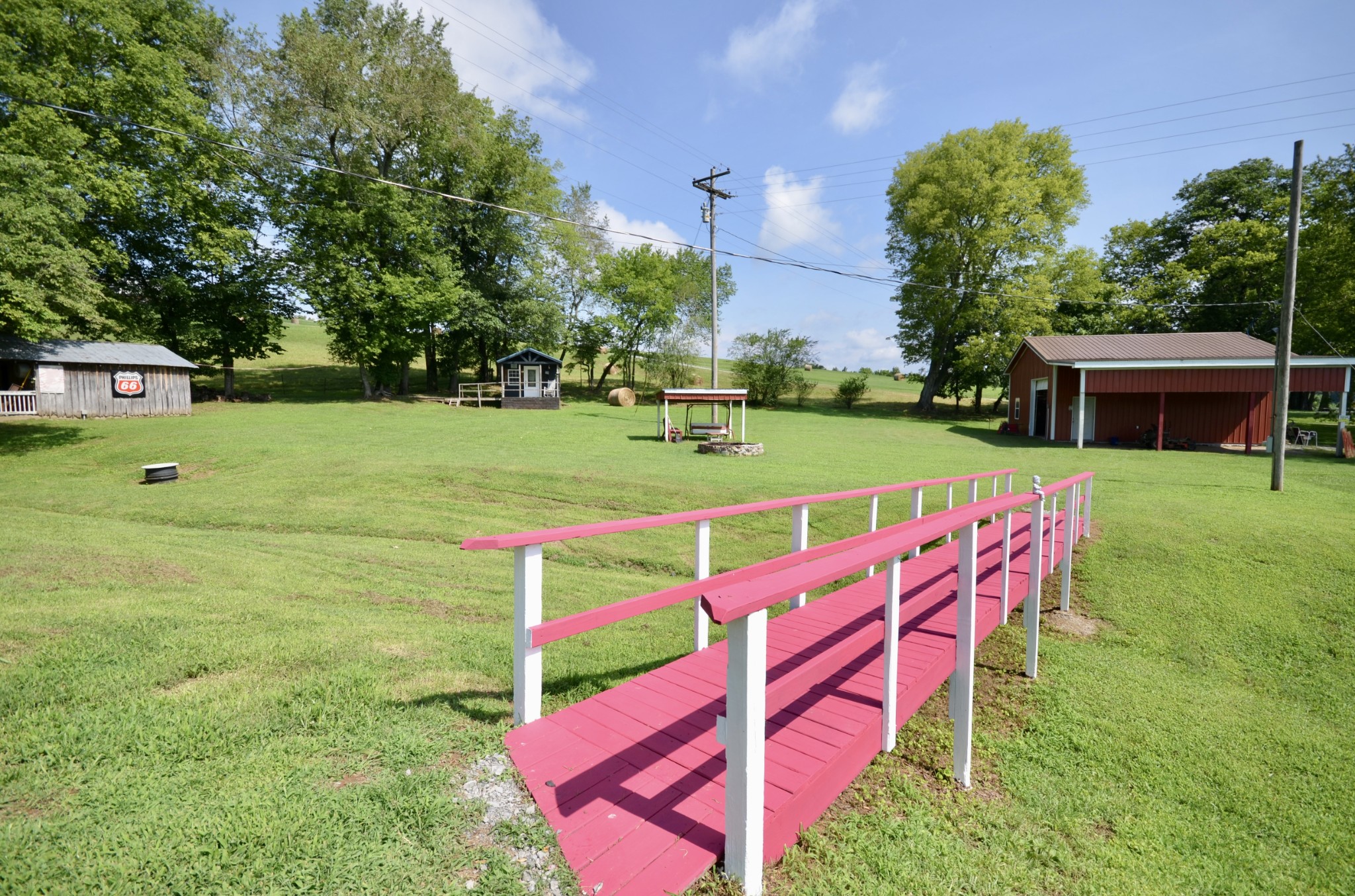 1355 Westfield Road Dickson, TN 37055 - Photo 14 of 83 a view of a chairs and table on the yard