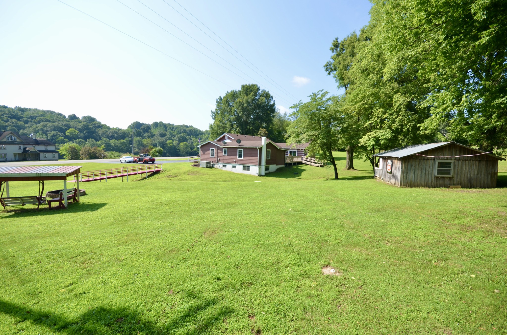 1355 Westfield Road Dickson, TN 37055 - Photo 17 of 83 a view of a house with a yard and sitting area