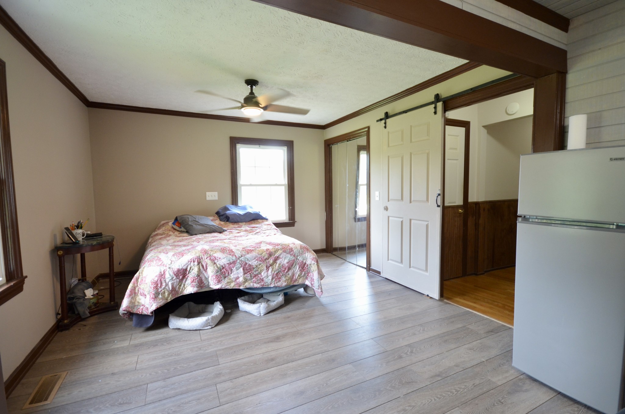 1355 Westfield Road Dickson, TN 37055 - Photo 46 of 83 a bed room with a bed and a refrigerator