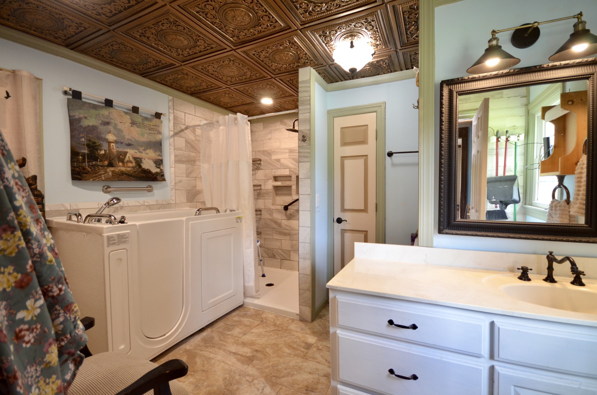 1355 Westfield Road Dickson, TN 37055 - Photo 51 of 83 a bathroom with a sink a mirror and a shower
