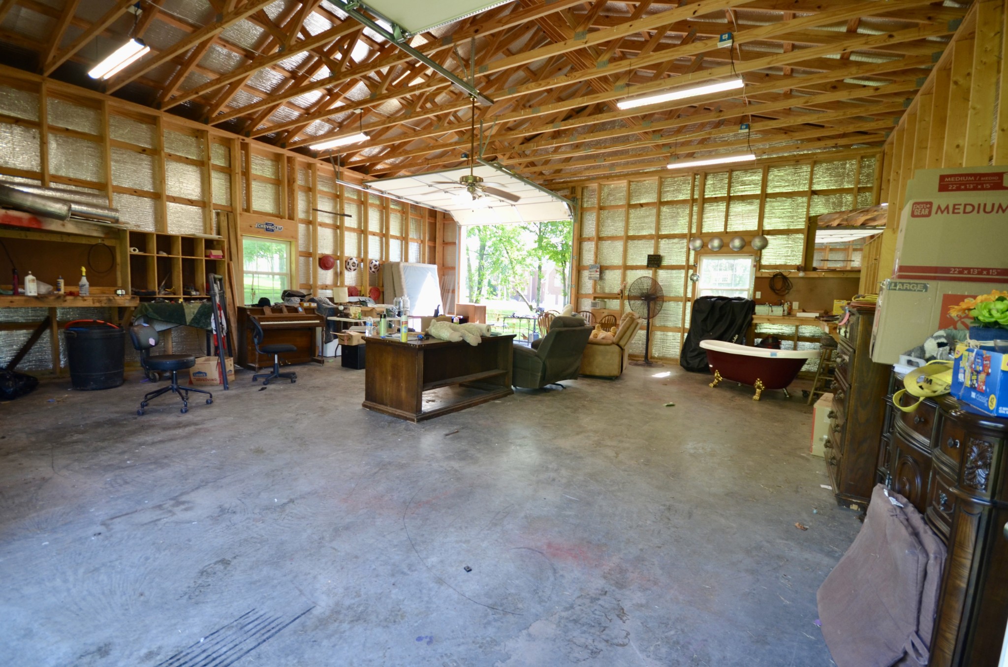 1355 Westfield Road Dickson, TN 37055 - Photo 71 of 83 a living room with furniture and a chandelier
