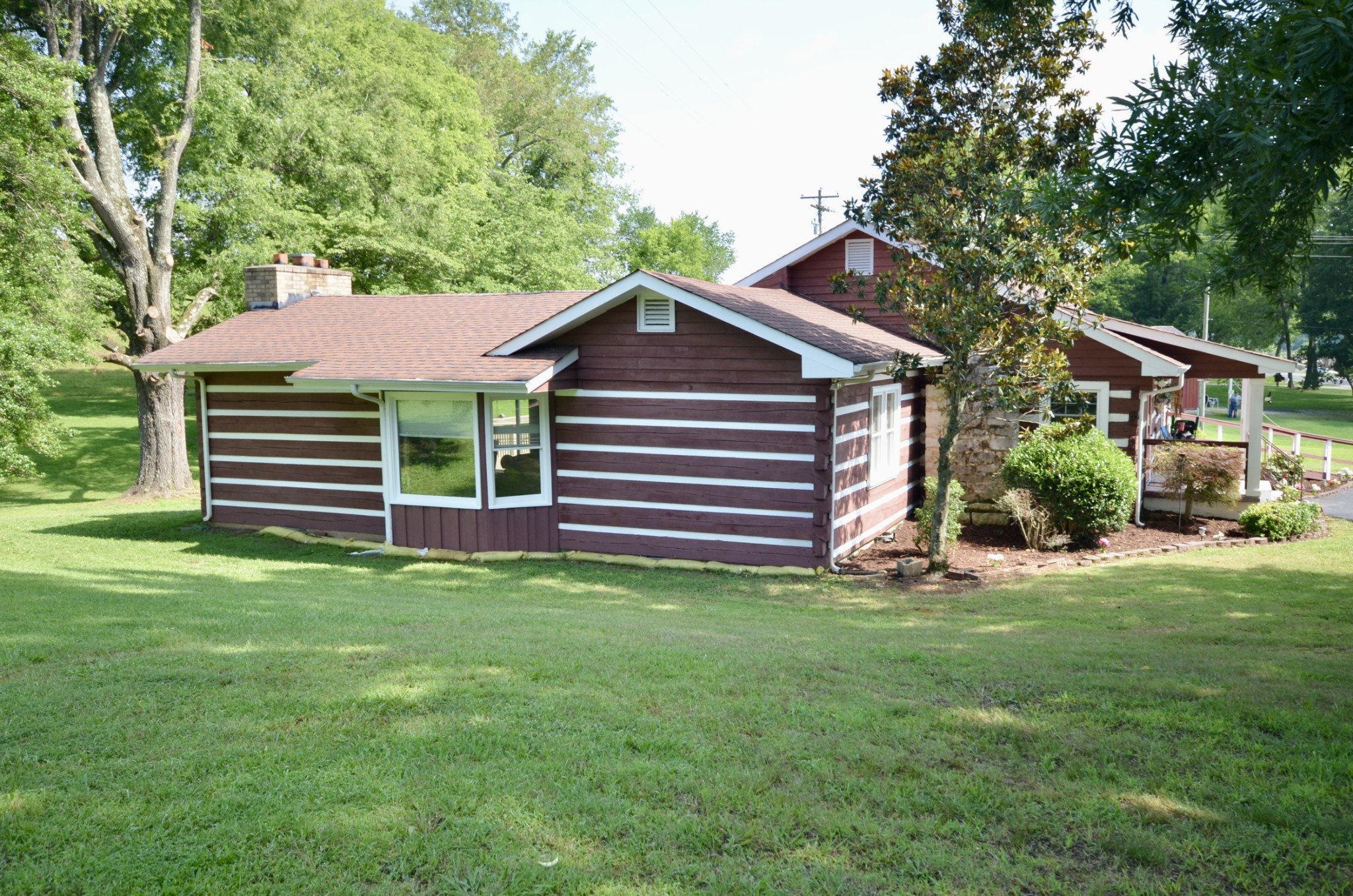1355 Westfield Road Dickson, TN 37055 - Photo 10 of 83 a front view of a house with a garden