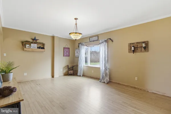 a view of livingroom with hardwood floor and window