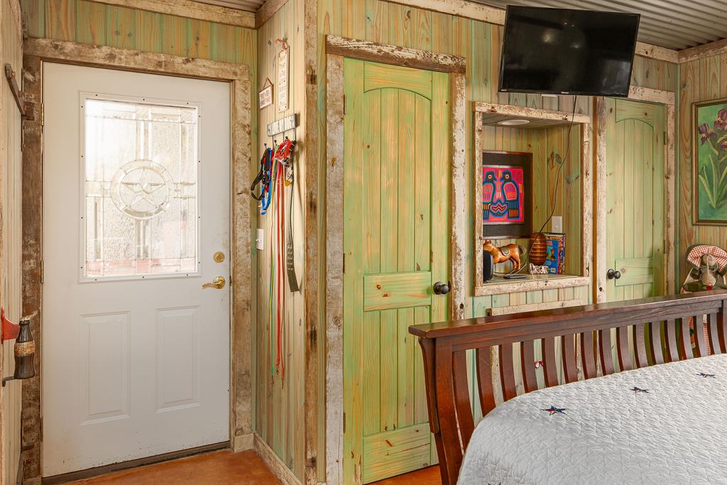 290 Japonica Road Hunt, TX 78024 - Photo 23 of 78 a view of a bathroom with a door and a porch