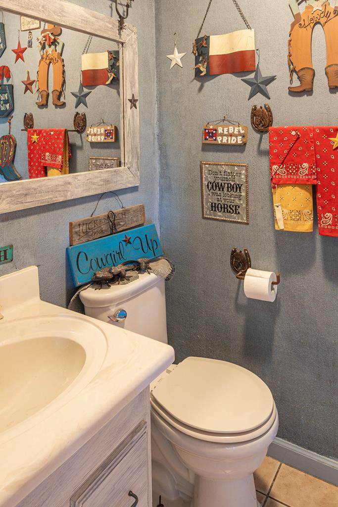 290 Japonica Road Hunt, TX 78024 - Photo 58 of 78 a bathroom with a toilet and a sink