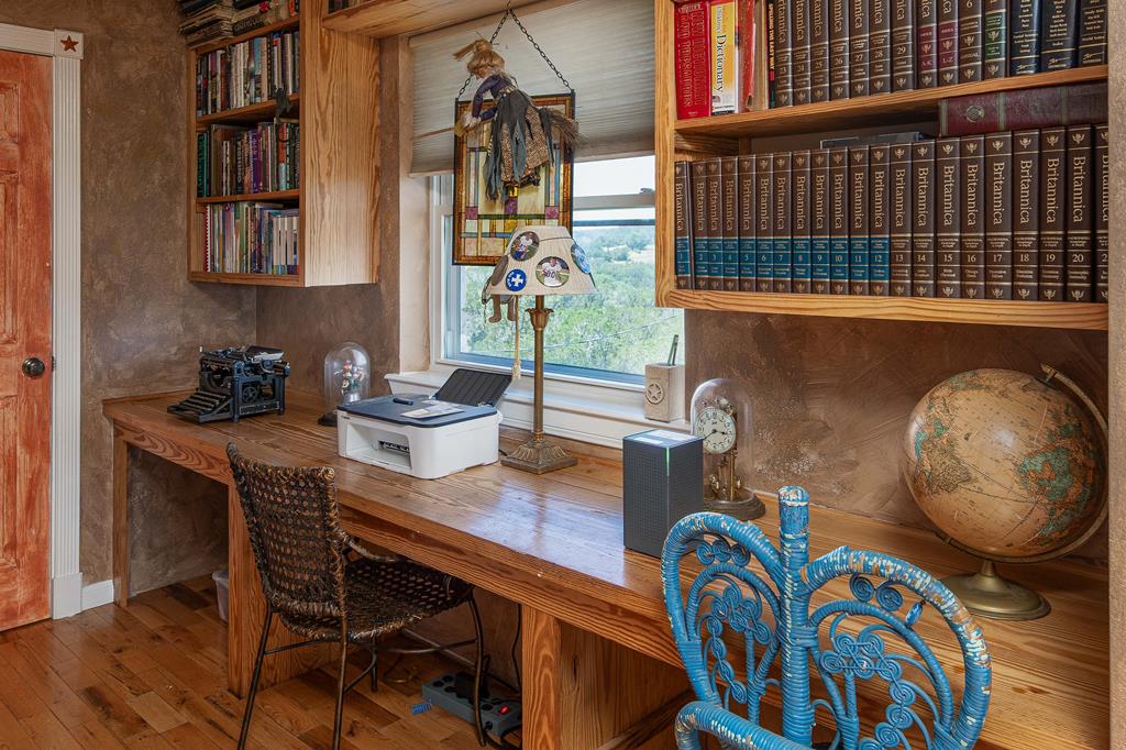 290 Japonica Road Hunt, TX 78024 - Photo 61 of 78 a dining room with furniture and wooden floor