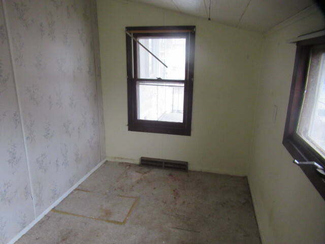 33 State Street Danville, IL 61832 - Photo 16 of 17 an empty room with a window