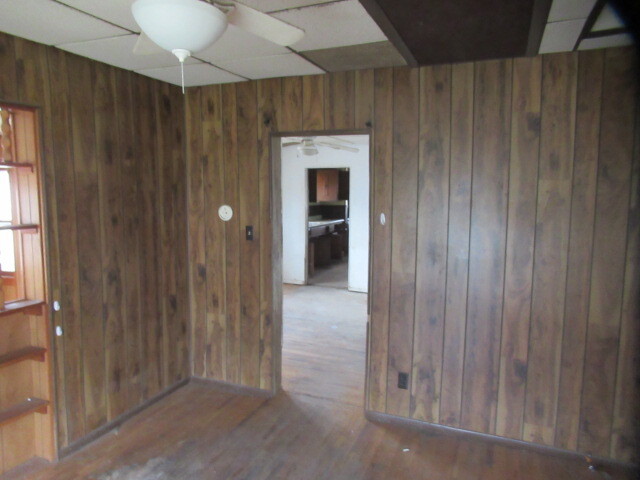 33 State Street Danville, IL 61832 - Photo 8 of 17 a view of a hallway with wooden shelves