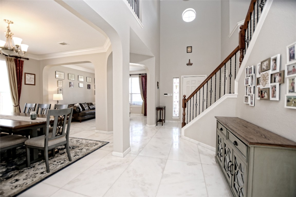15701 Pumpkin Ridge Drive Austin, TX 78717 - Photo 3 of 37 Entryway with arched walkway. gorgeous luxurious marble flooring.