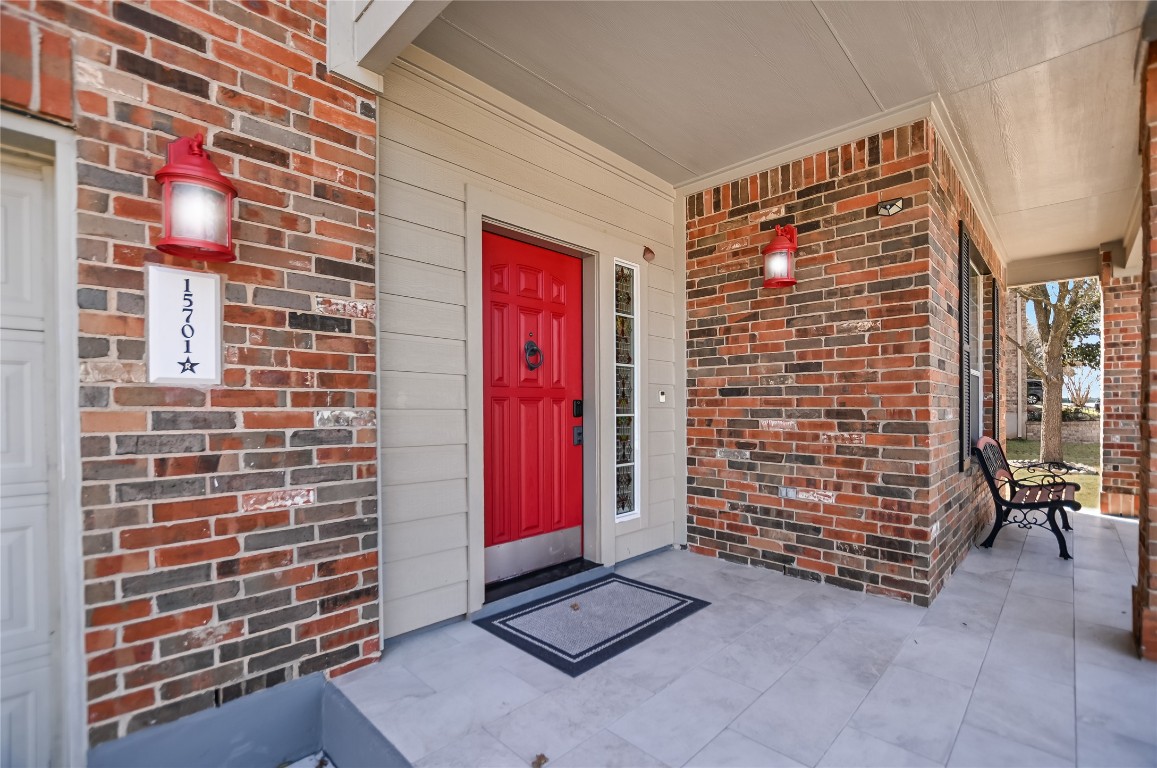 15701 Pumpkin Ridge Drive Austin, TX 78717 - Photo 37 of 37 Doorway to property featuring a spacious porch perfect for morning coffee or tea.