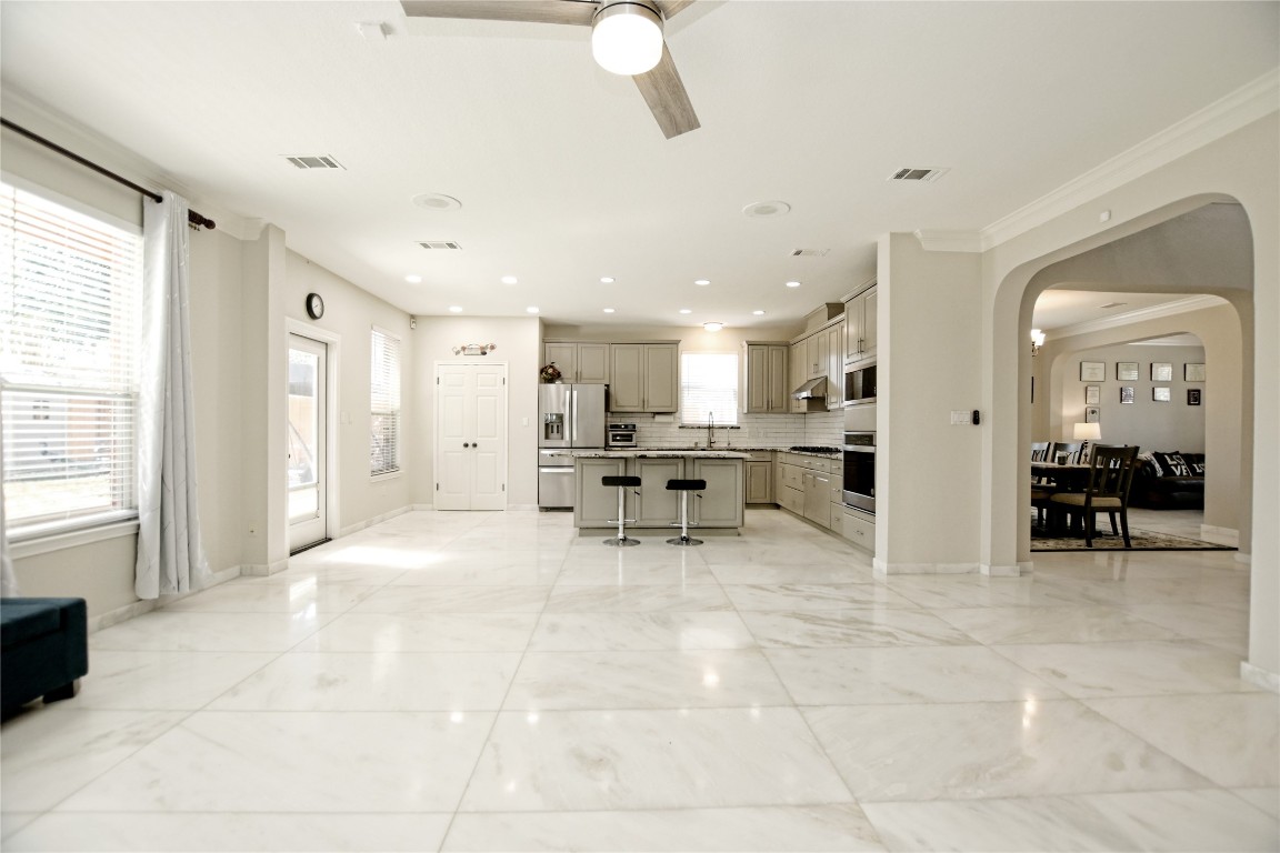 15701 Pumpkin Ridge Drive Austin, TX 78717 - Photo 4 of 37 Living room with gorgeous marble flooring.