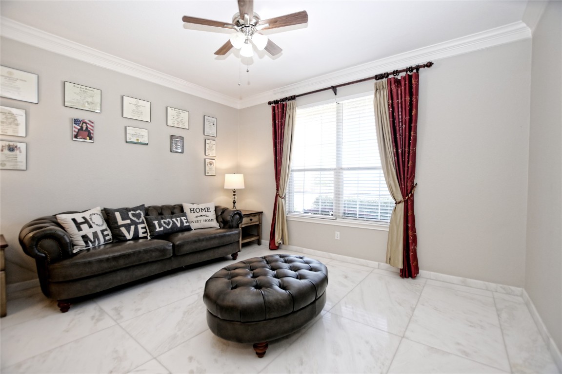 15701 Pumpkin Ridge Drive Austin, TX 78717 - Photo 7 of 37 Formal living room with stylish marble flooring.