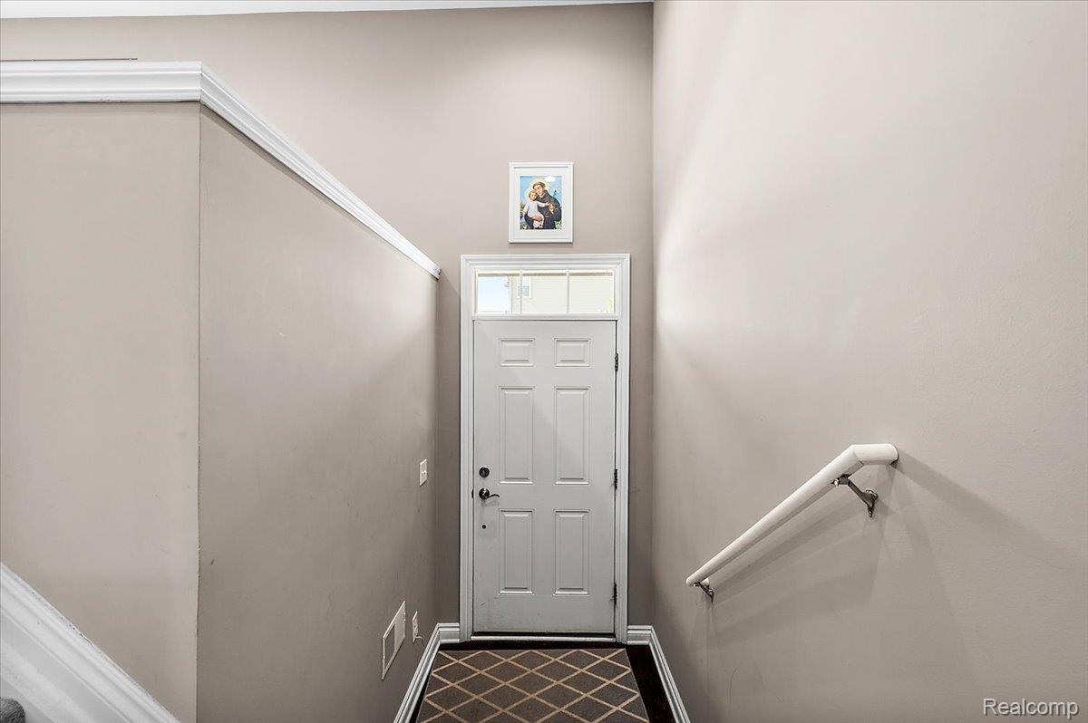2877 Hartwick Drive Rochester, MI 48307 - Photo 10 of 44 Doorway featuring baseboards