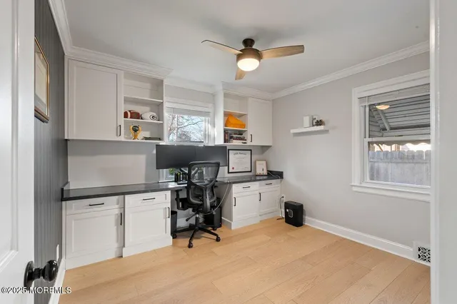 a workspace with furniture and window