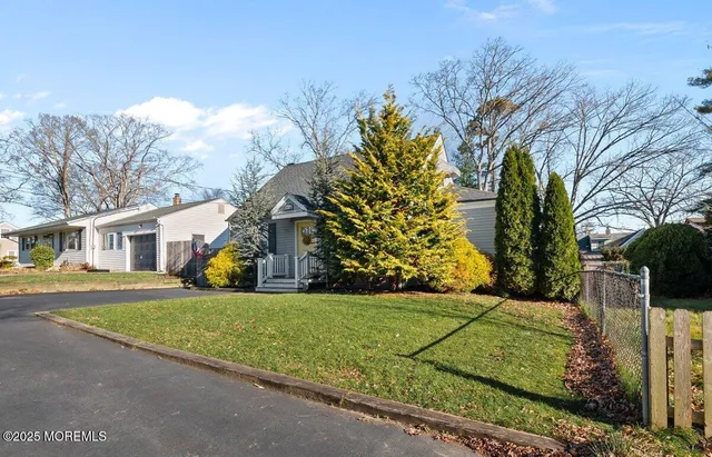 a view of a trees in front of a house
