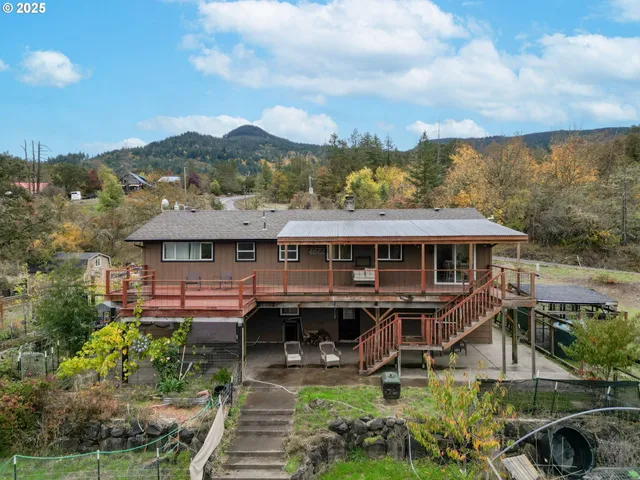 an aerial view of a house with a garden