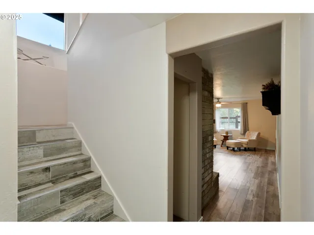 a view of entryway with wooden floor