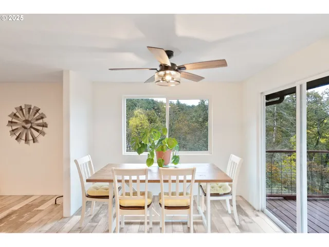 a kitchen with granite countertop a refrigerator and a sink