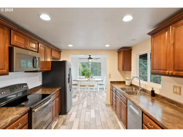 a bathroom with a shower and a sink
