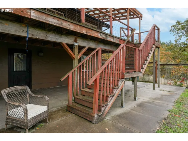 a view of outdoor space with wooden floor