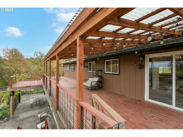 a balcony with wooden floor