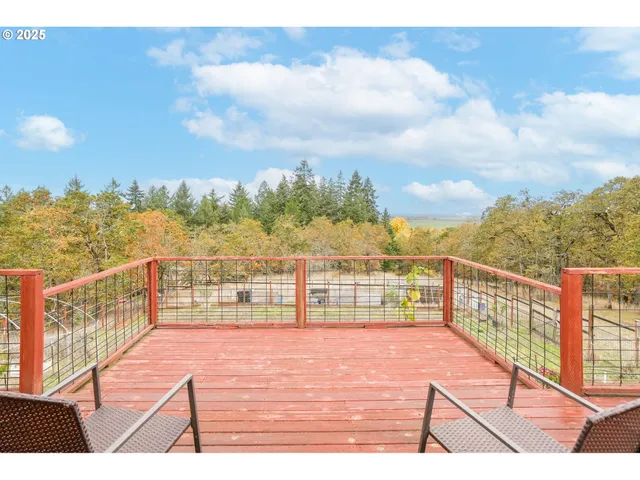 a view of outdoor space with trees all around