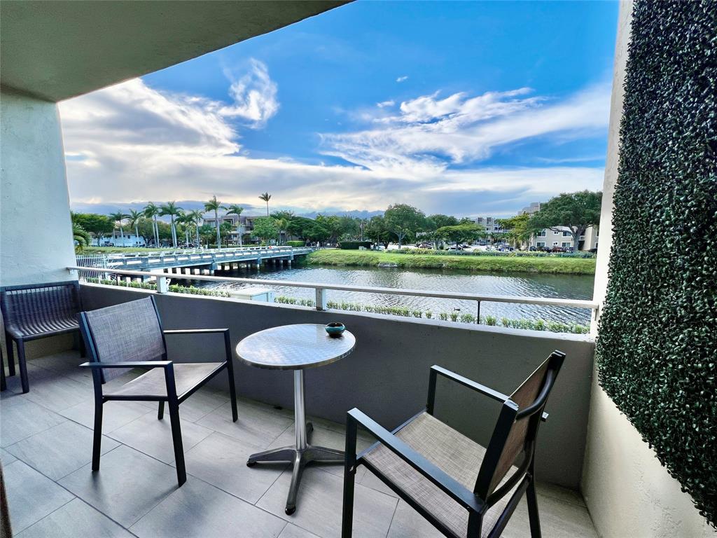 a view of a chairs and table in the terrace