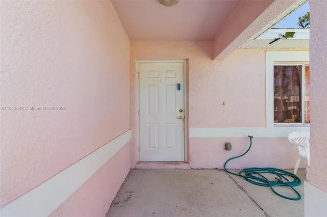 a workspace with furniture and a window