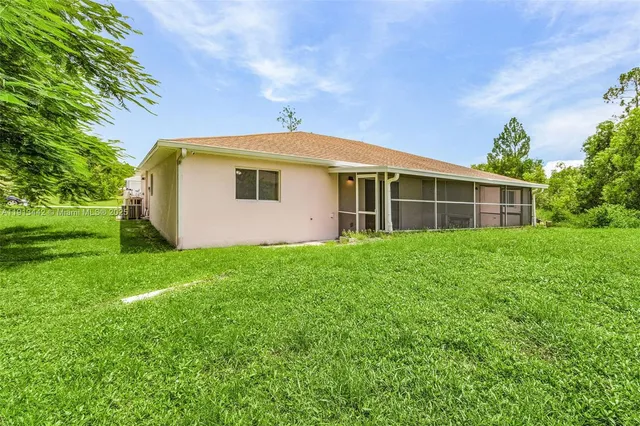 a aerial view of a house with garden