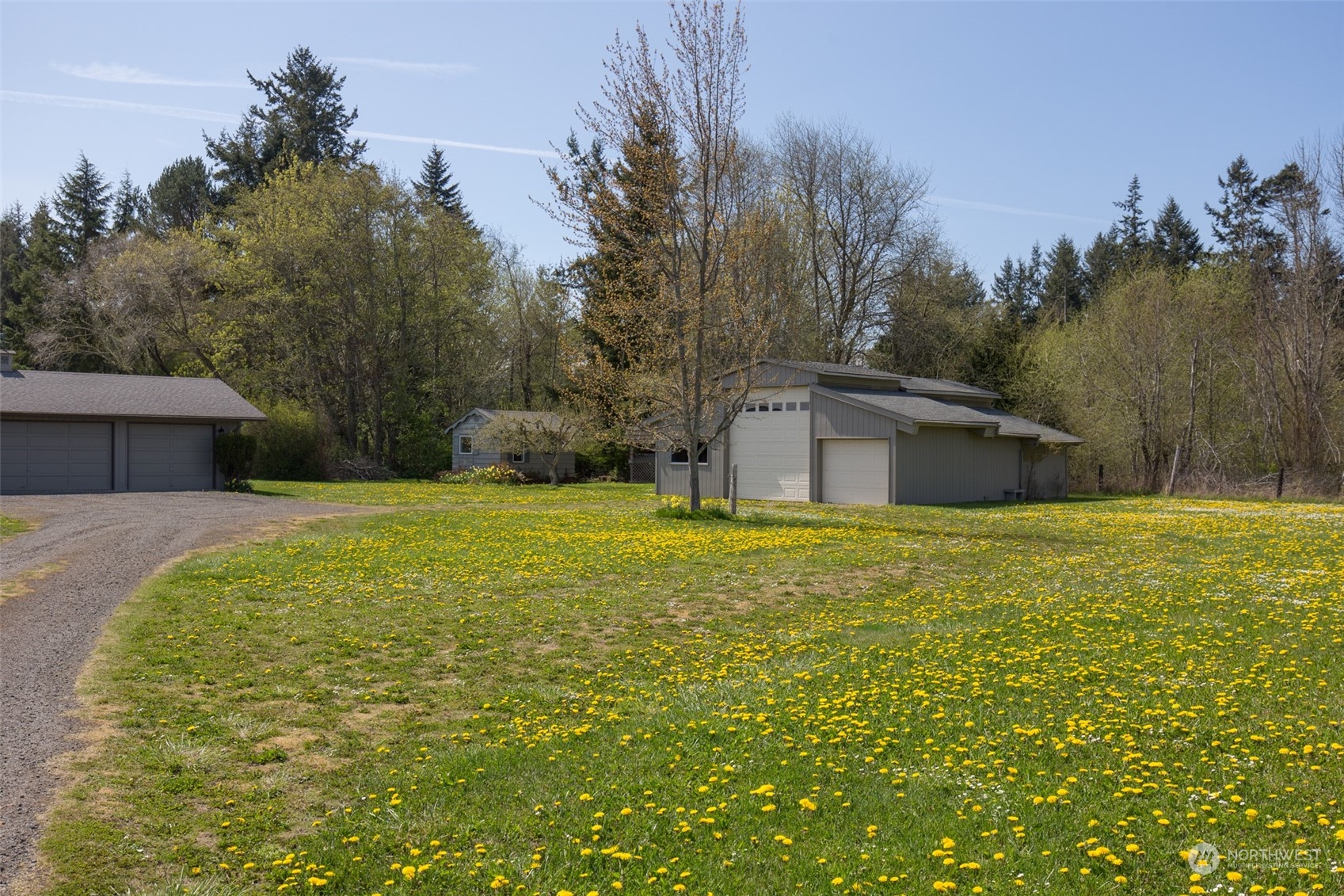 83 Mariners Point Road Sequim, WA 98382 - Photo 7 of 40 a large pool that has lawn chairs with wooden fence