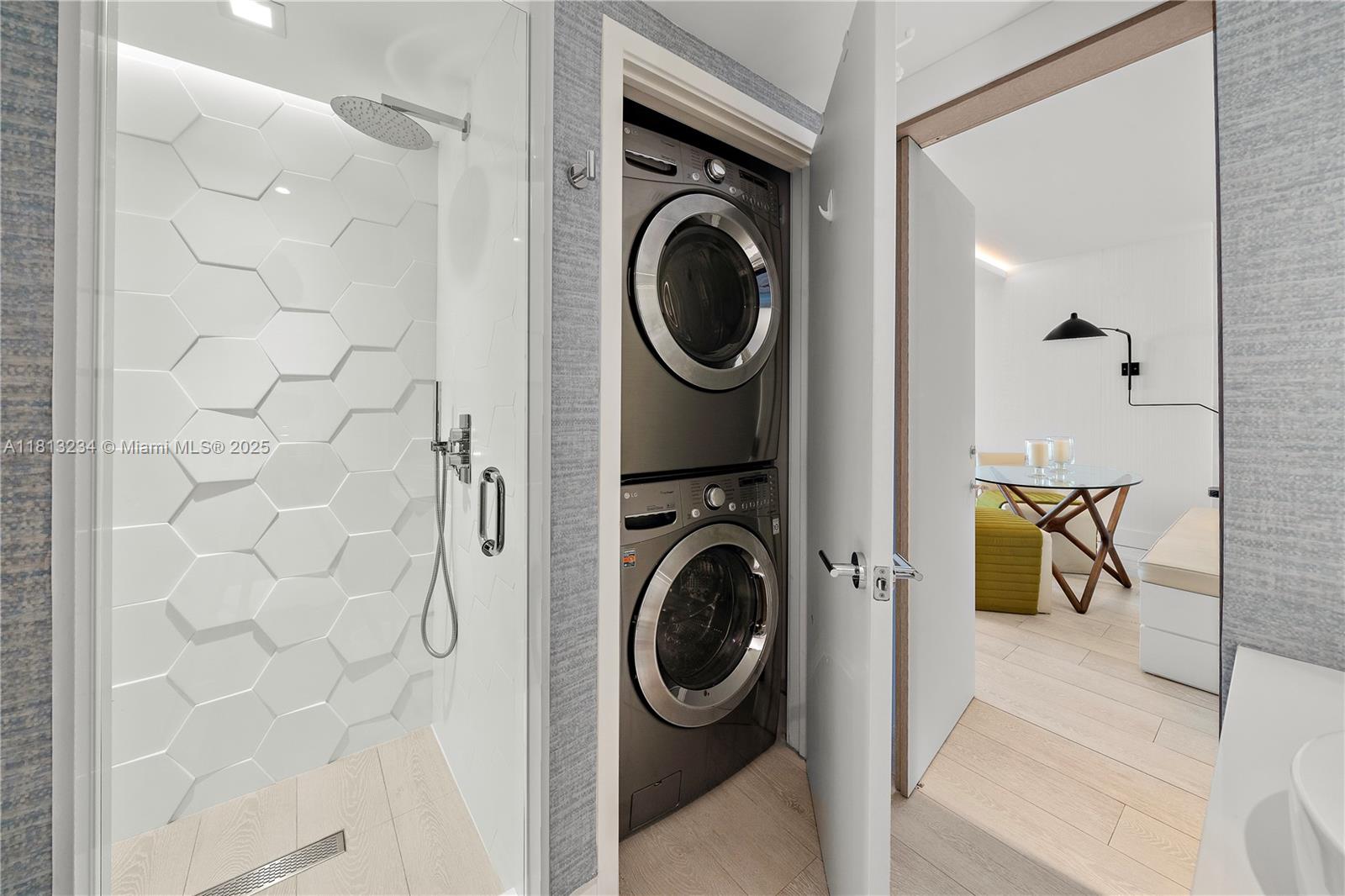 1500 Ocean Drive, Unit 910 Miami Beach, FL 33139 - Photo 11 of 40 a utility room with dryer and washer