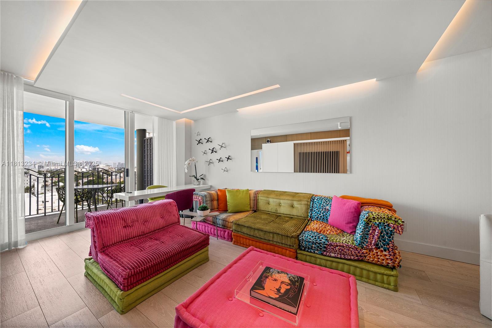 1500 Ocean Drive, Unit 910 Miami Beach, FL 33139 - Photo 16 of 40 a living room with furniture and a couch