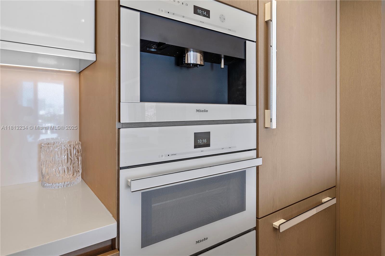 1500 Ocean Drive, Unit 910 Miami Beach, FL 33139 - Photo 19 of 40 a bathroom with a sink and a mirror