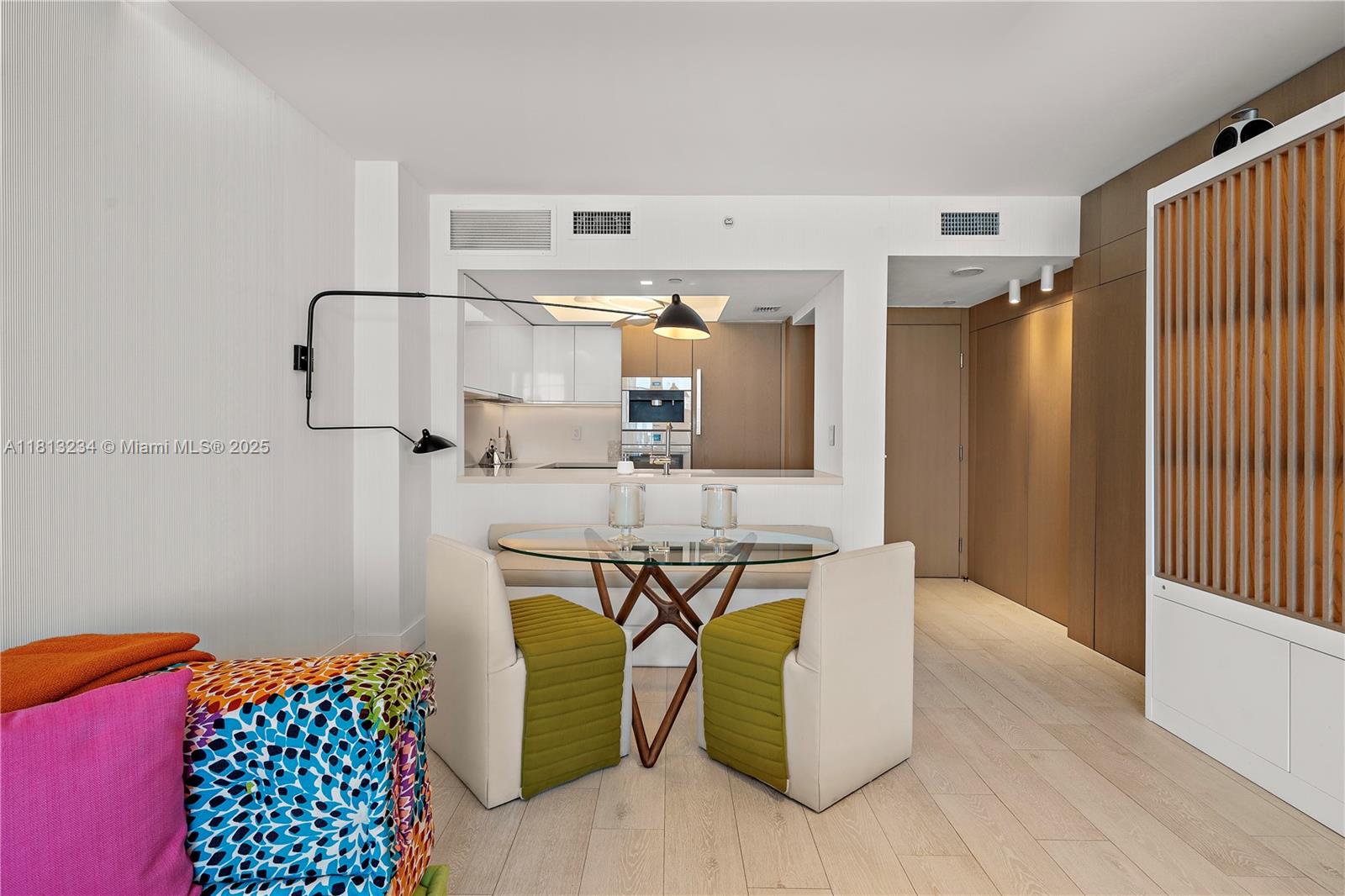 1500 Ocean Drive, Unit 910 Miami Beach, FL 33139 - Photo 22 of 40 a view of kitchen with furniture and wooden floor