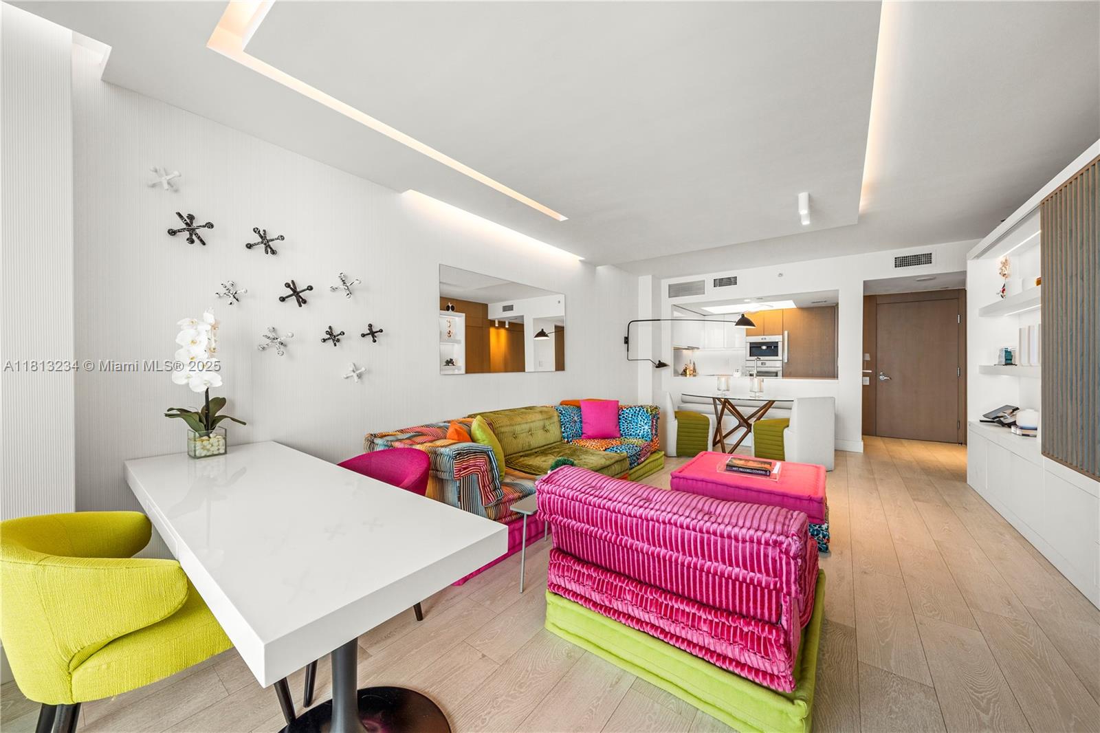 1500 Ocean Drive, Unit 910 Miami Beach, FL 33139 - Photo 25 of 40 a living room with furniture and kitchen view