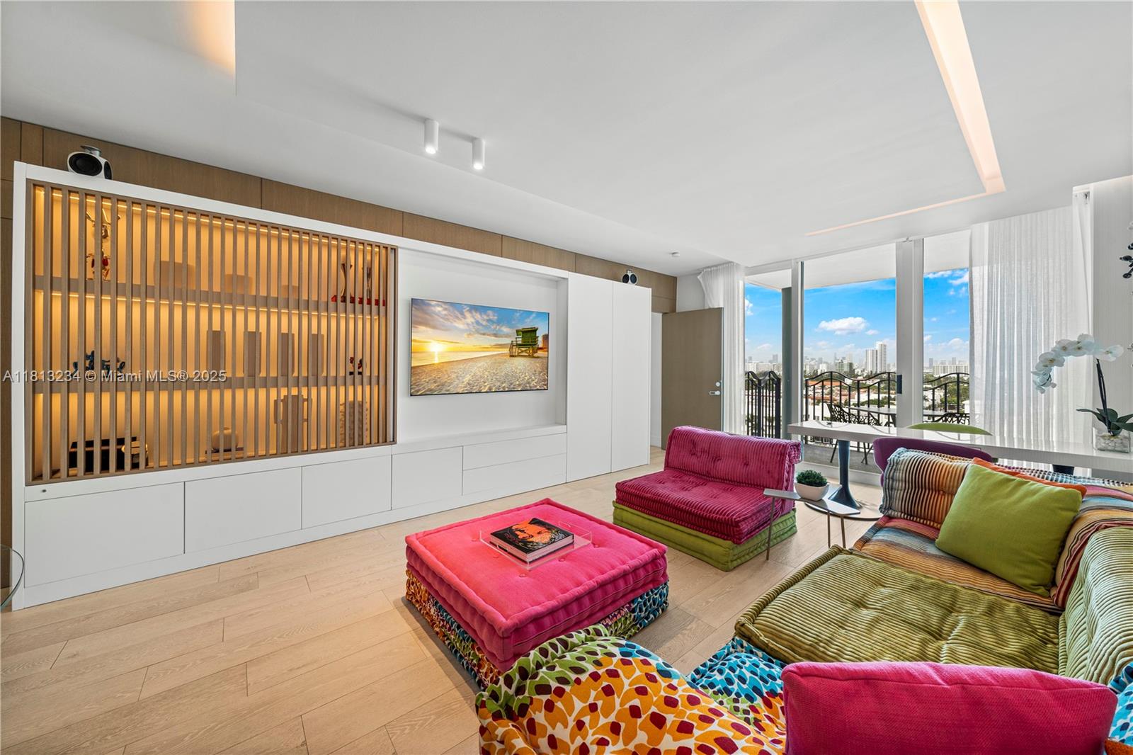 1500 Ocean Drive, Unit 910 Miami Beach, FL 33139 - Photo 3 of 40 a living room with furniture and a floor to ceiling window