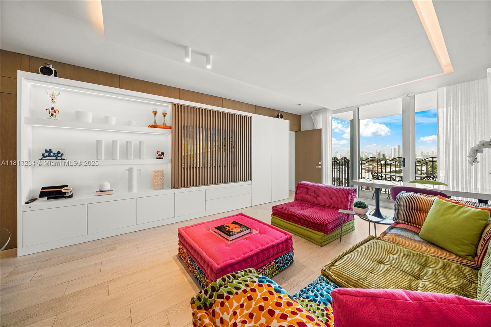 1500 Ocean Drive, Unit 910 Miami Beach, FL 33139 - Photo 4 of 40 a living room with furniture and a large window