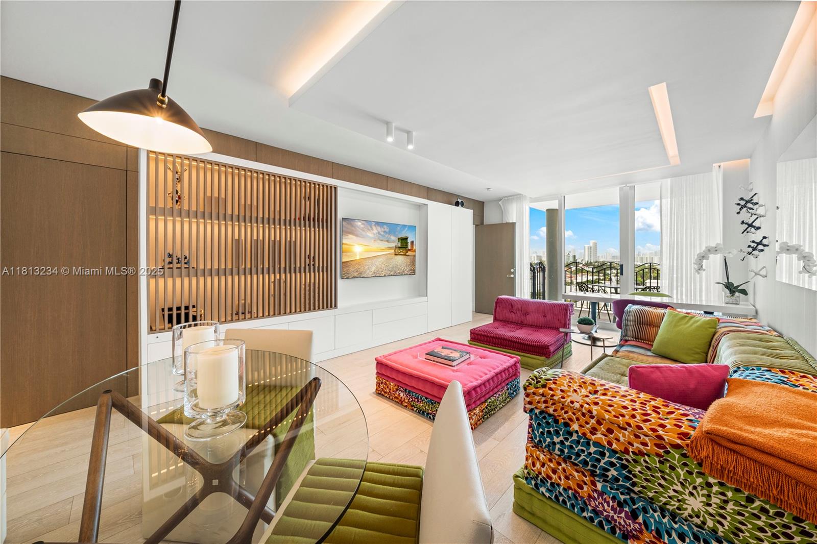 1500 Ocean Drive, Unit 910 Miami Beach, FL 33139 - Photo 5 of 40 a living room with furniture and a window