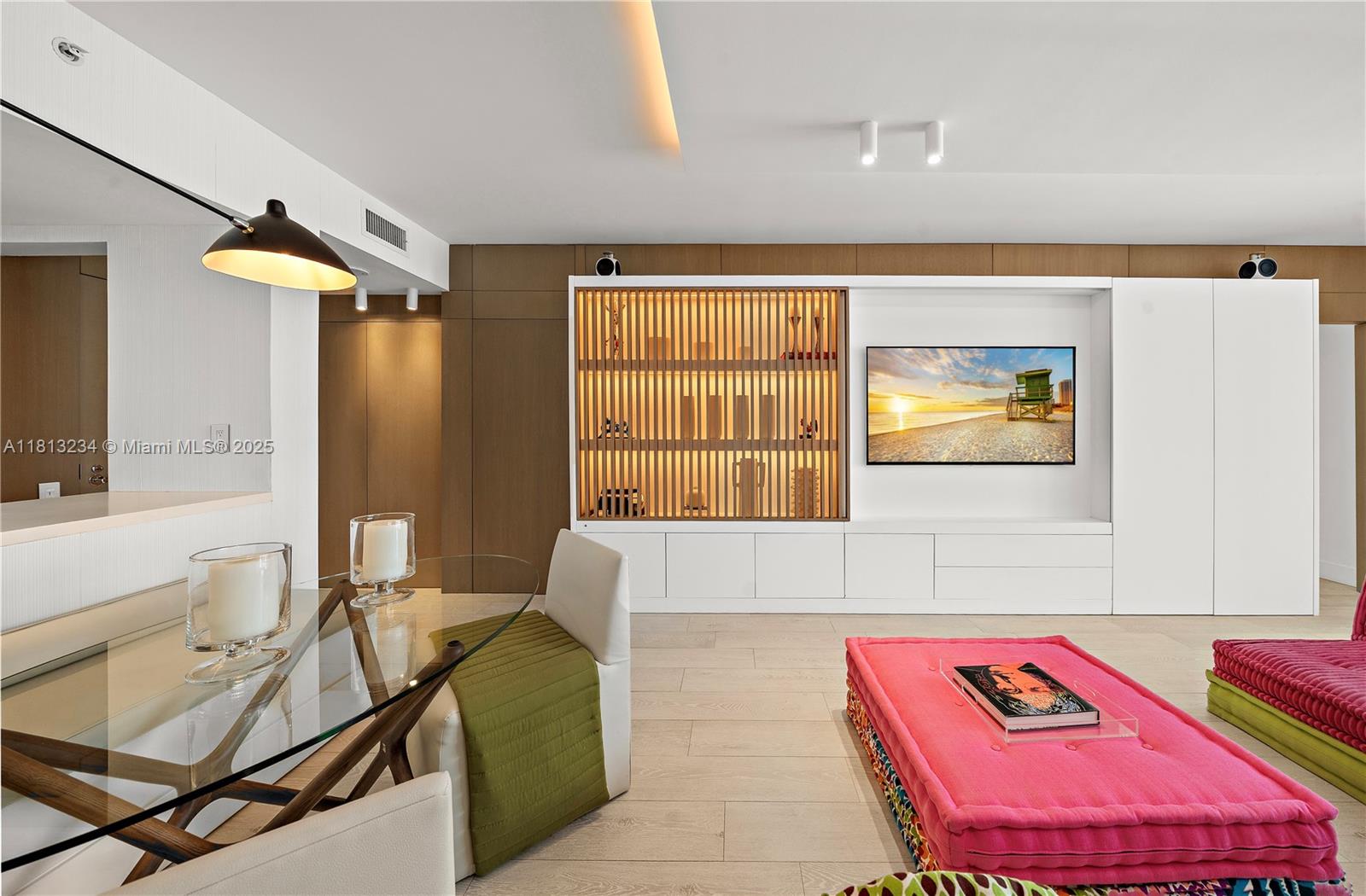 1500 Ocean Drive, Unit 910 Miami Beach, FL 33139 - Photo 6 of 40 a living room with a couch and a table