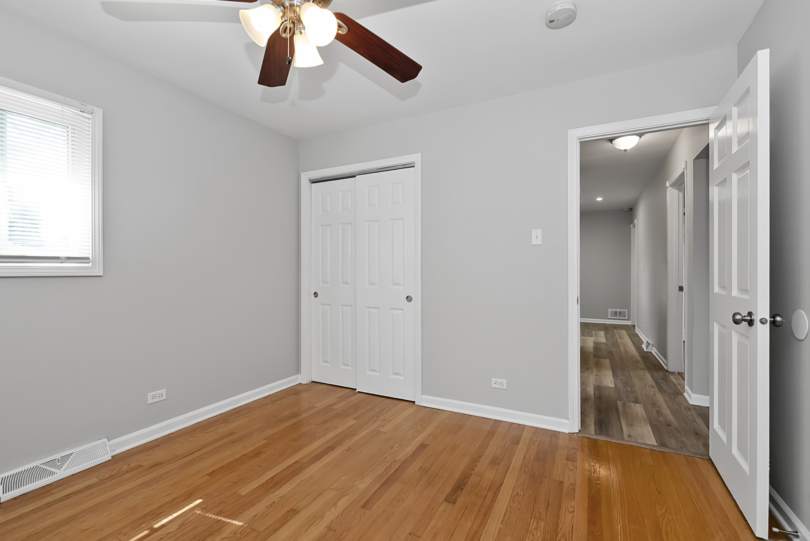11700 South Harding Avenue Alsip, IL 60803 - Photo 12 of 17 a view of empty room with wooden floor