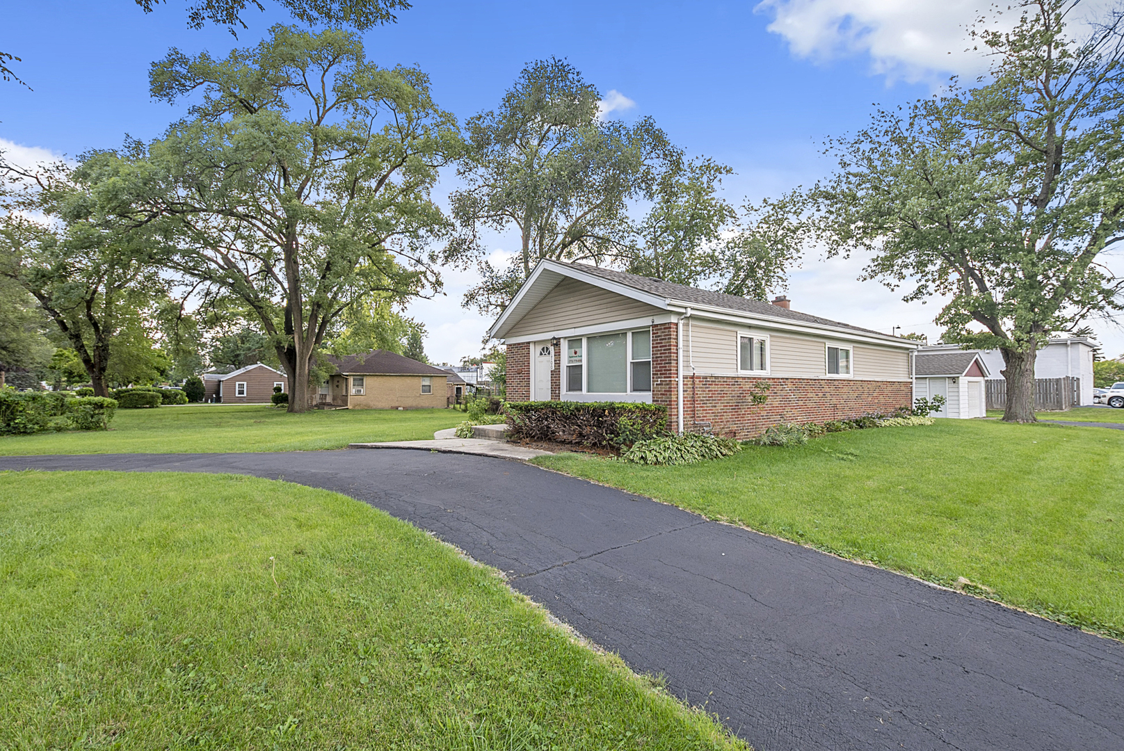 11700 South Harding Avenue Alsip, IL 60803 - Photo 3 of 17 a front view of house with yard and green space