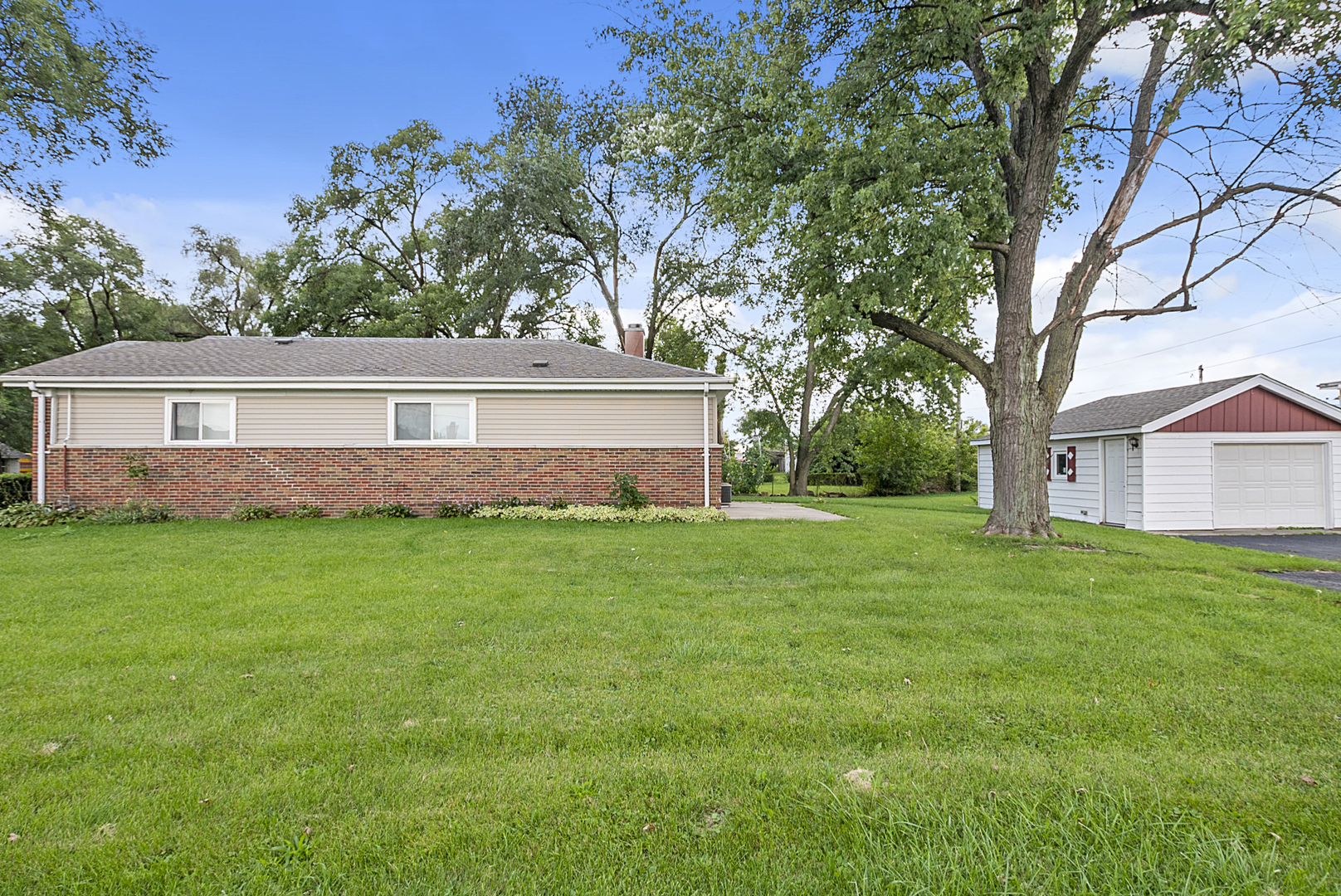 11700 South Harding Avenue Alsip, IL 60803 - Photo 4 of 17 a view of house with backyard