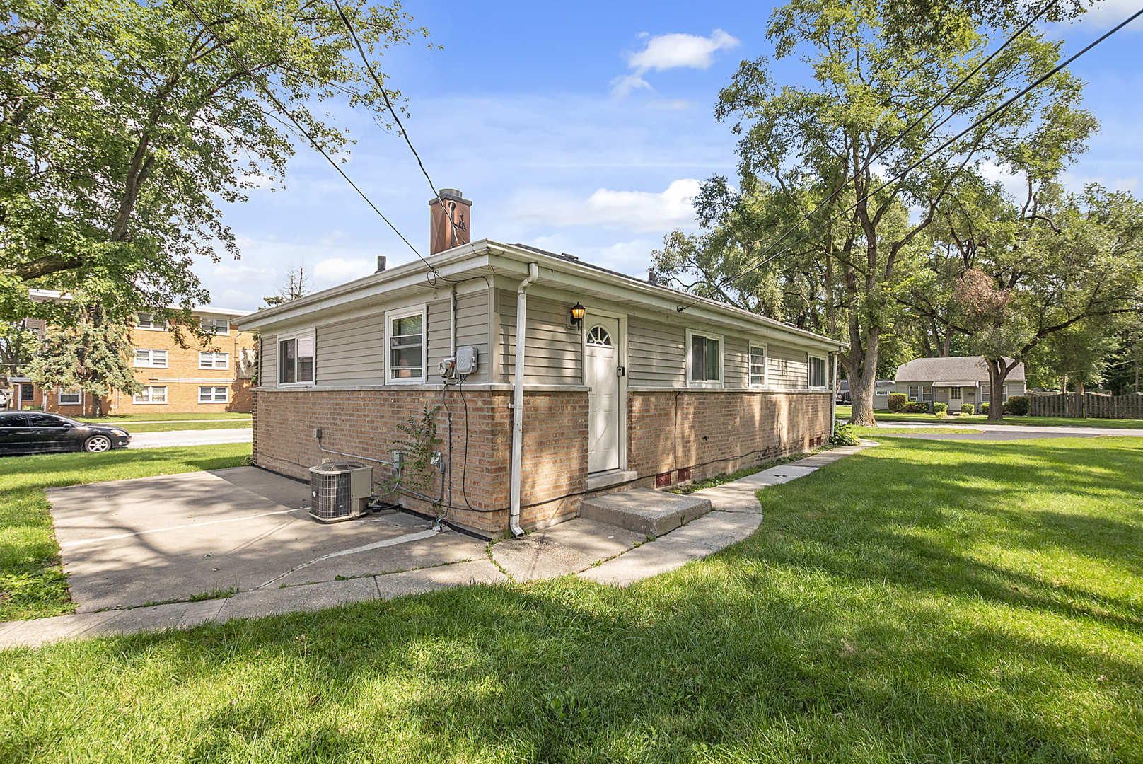 11700 South Harding Avenue Alsip, IL 60803 - Photo 5 of 17 a view of backyard with a garden and trees