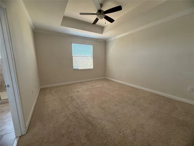 a bathroom with a shower sink and mirror