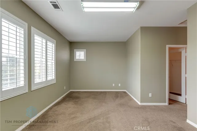 an empty room with windows