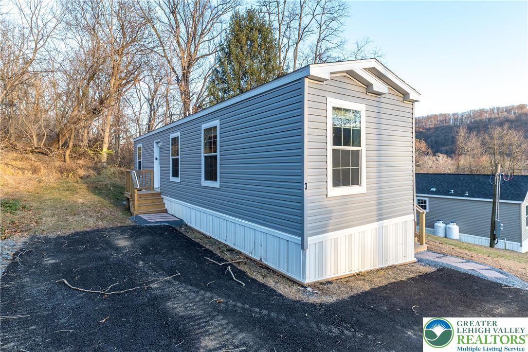 465 Royal Manor Road, Unit LOT 3 Easton, PA 18042 - Photo 1 of 13 a view of a house with a yard