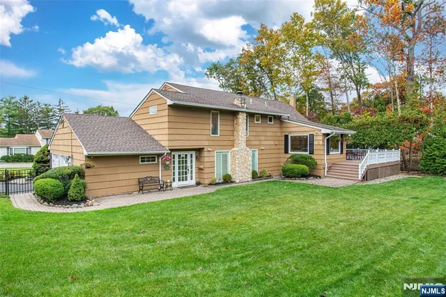 a view of a backyard of the house