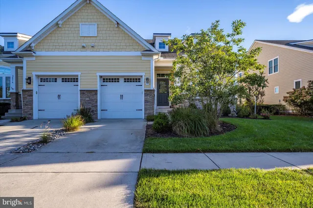 a living room with furniture a fireplace and a fireplace