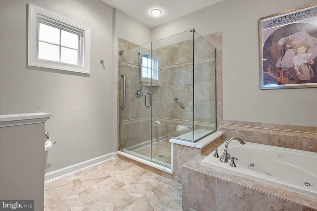 an aerial view of a house with outdoor space