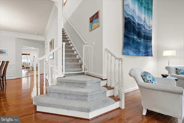 an aerial view of residential building and ocean